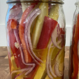 sweet and sour summer vegetables marinating in a jar