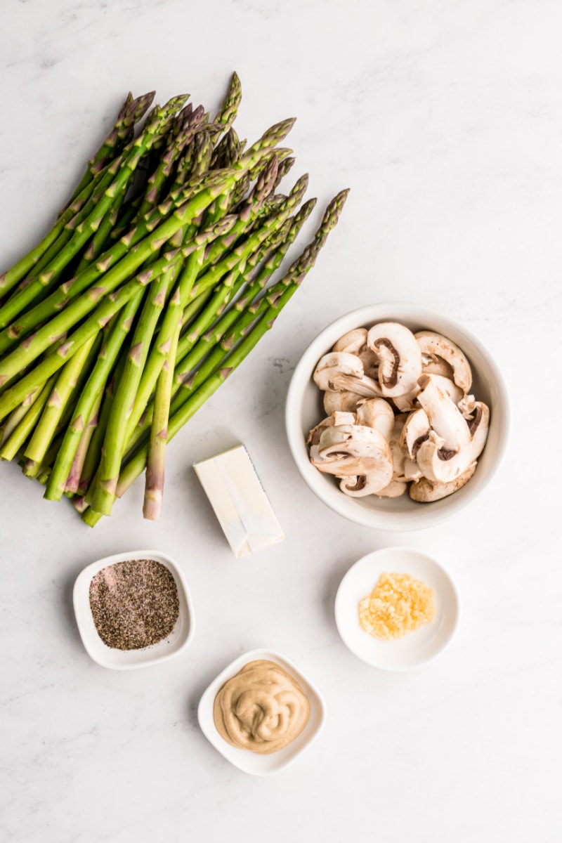 ingredients displayed for making asparagus with garlic mustard sauce