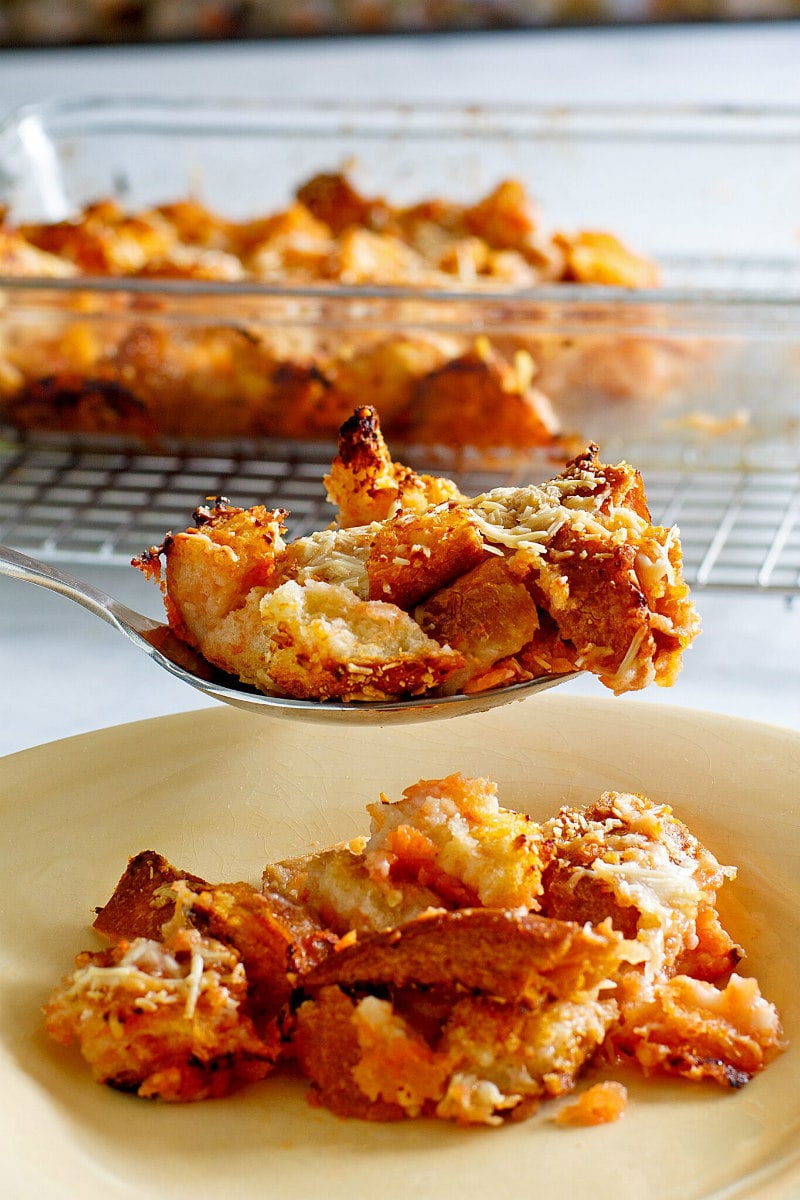 Tomato Bread Pudding recipe from RecipeGirl.com #tomato #bread #pudding #recipe #RecipeGirl A spoonful of Tomato Bread Pudding