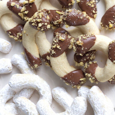greek butter cookies with chocolate and powdered sugar