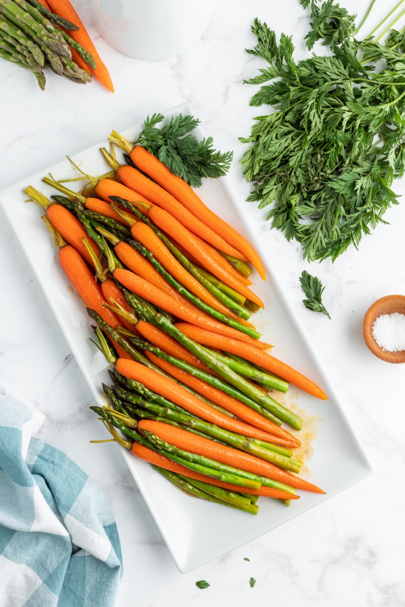asparagus and carrots on serving platter