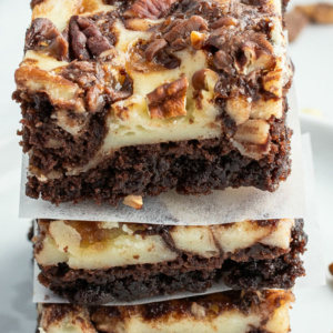 stack of three cream cheese swirl brownies