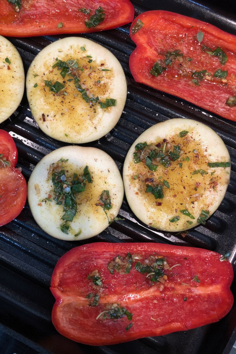 Grilled Aubergine and Peppers recipe from RecipeGirl.com #grilled #grilling #aubergine #eggplant #peppers #red #redpepper #bell #redbellpeppers #summer #vegetables #recipe #RecipeGirl Grilling Aubergine and Peppers
