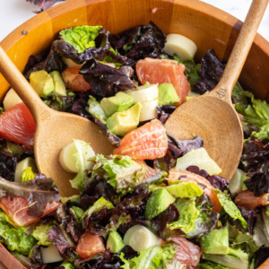 pinterest image for hearts of palm avocado salad