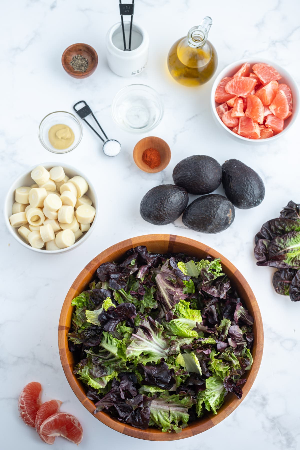 ingredients displayed for making hearts of palm avocado salad