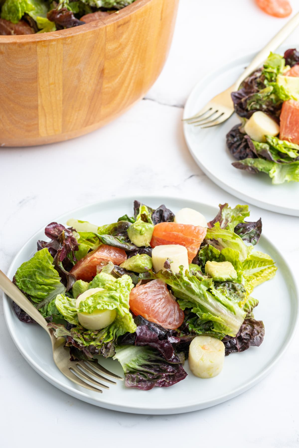 serving of hearts of palm avocado salad on plate