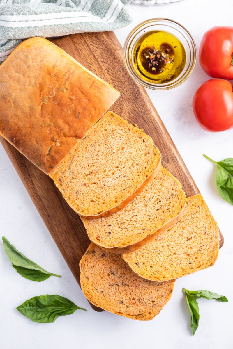 loaf of bread on a board sliced