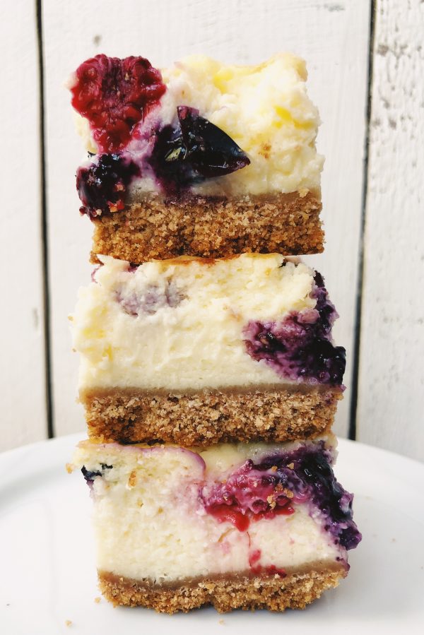 Three Red White and Blueberry Cheesecake Bars stacked