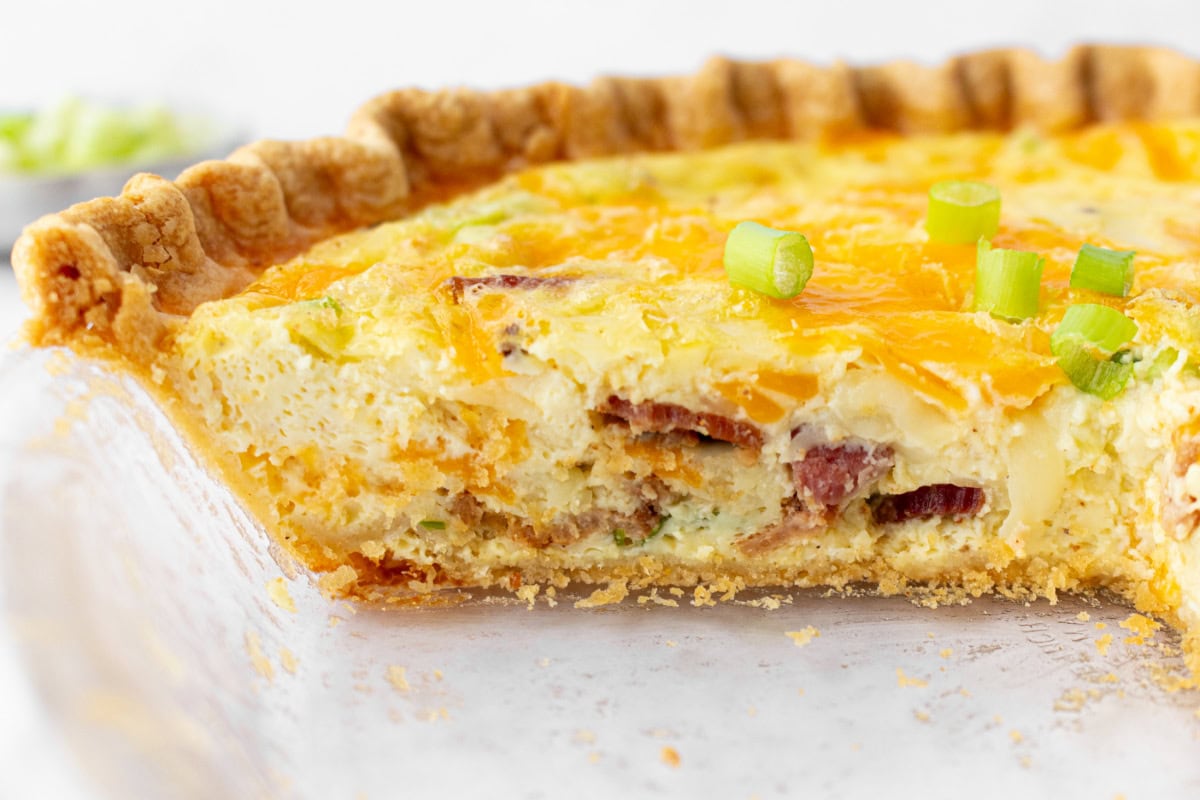 bacon and cheese quiche cut open to see inside