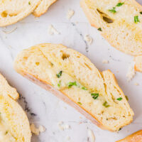 slices of cheese and herb bread