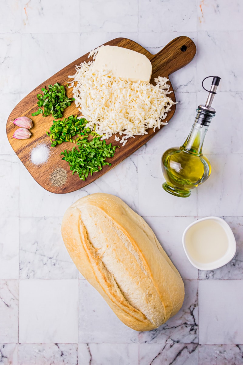 ingredients displayed for making cheese and herb bread
