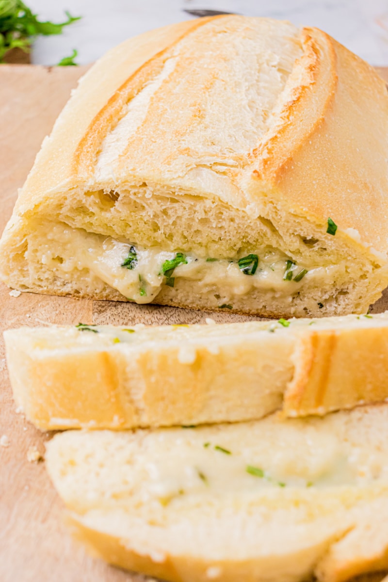 cheese and herb bread loaf sliced into