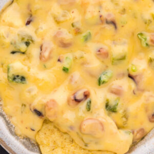 pinterest image for cheesy black eyed pea dip