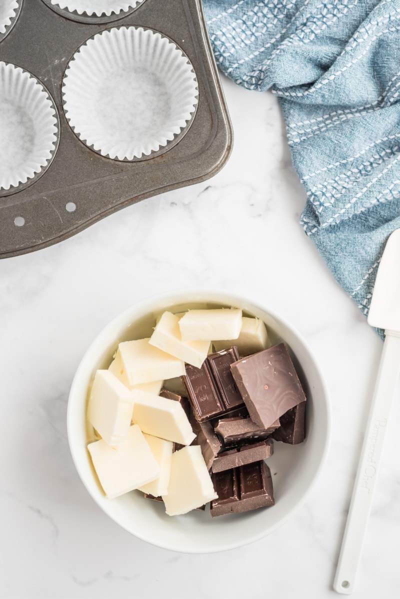 two kinds of chocolate in a white bowl