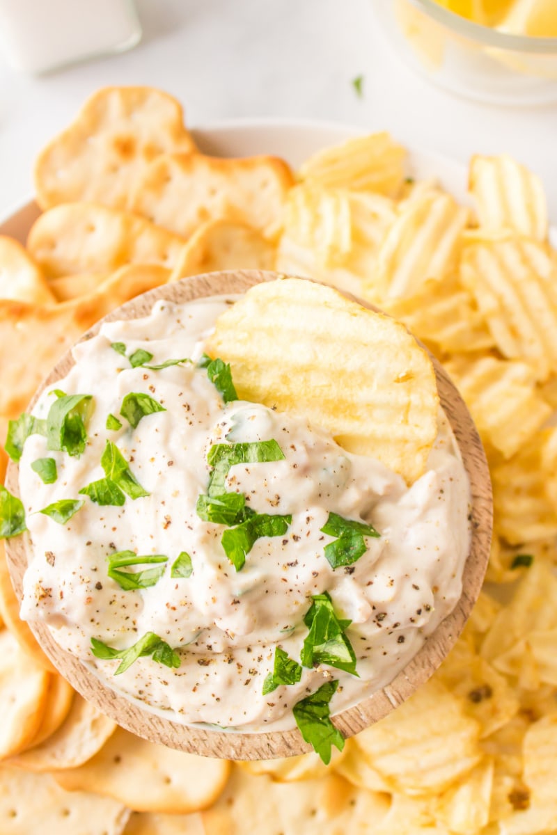 clam dip in bowl with chips