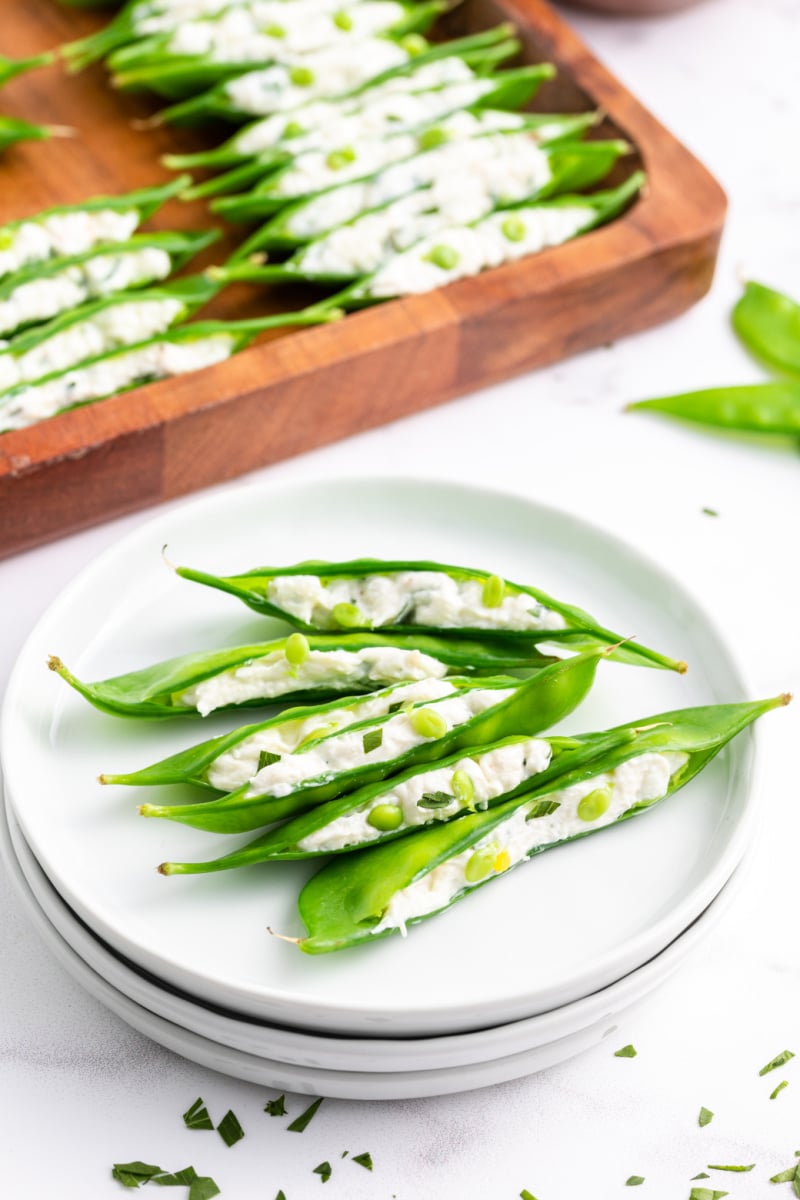 crab and cream cheese stuffed snow peas on a plate