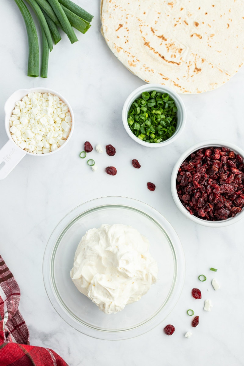 ingredients displayed for making cranberry feta pinwheels