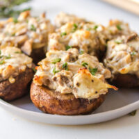 goat cheese stuffed mushrooms on plate