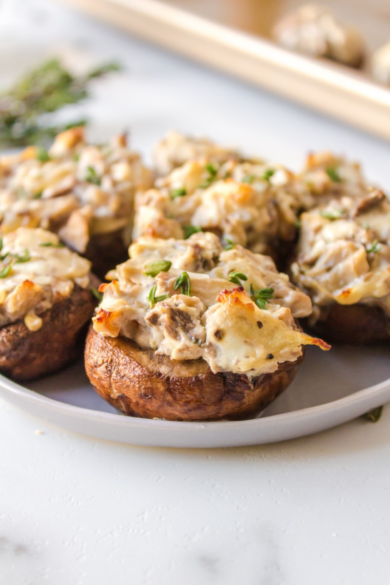 goat cheese stuffed mushrooms on plate