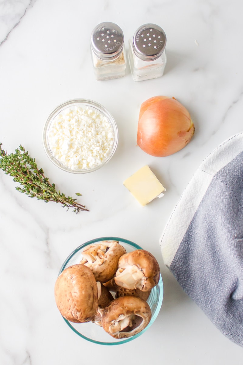 ingredients displayed for making goat cheese stuffed mushrooms