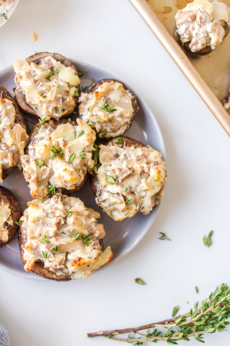 goat cheese stuffed mushrooms on platter