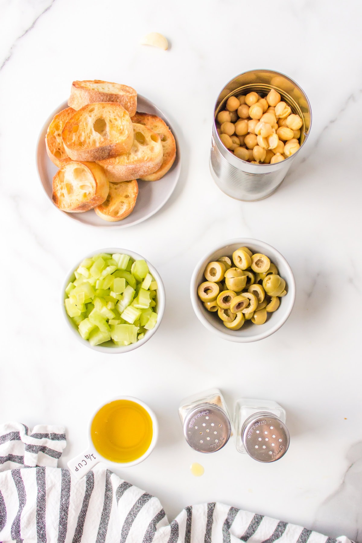 ingredients displayed for making greek crostini