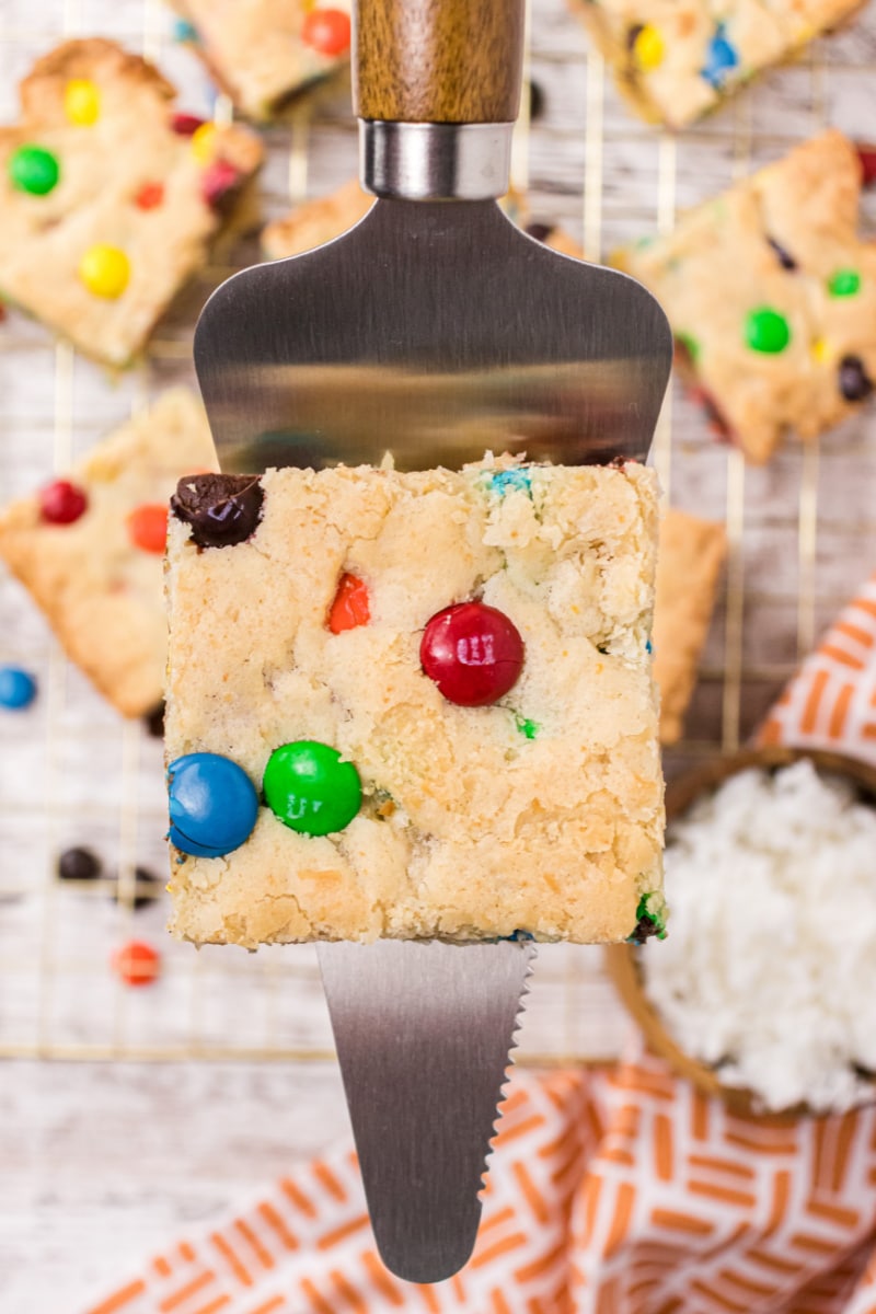 spatula lifting M&M blondie