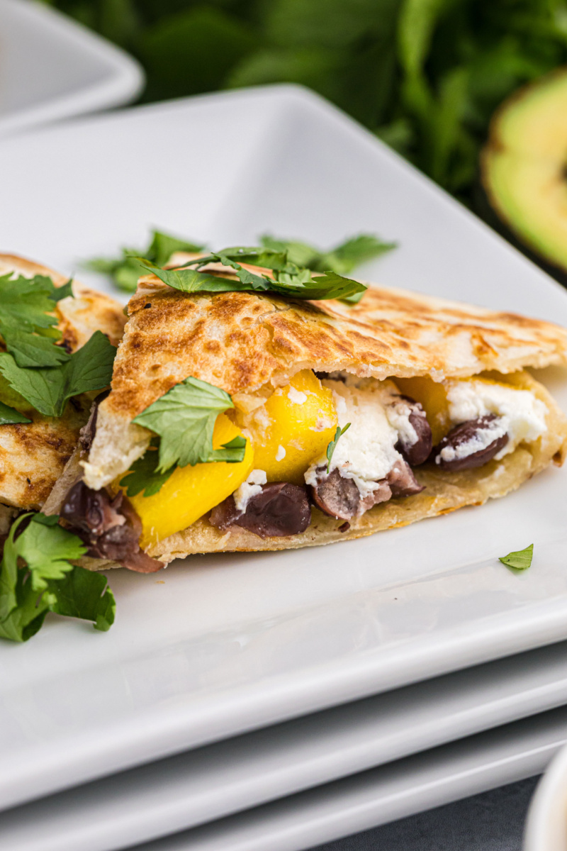 slice of mango black bean goat cheese quesadilla