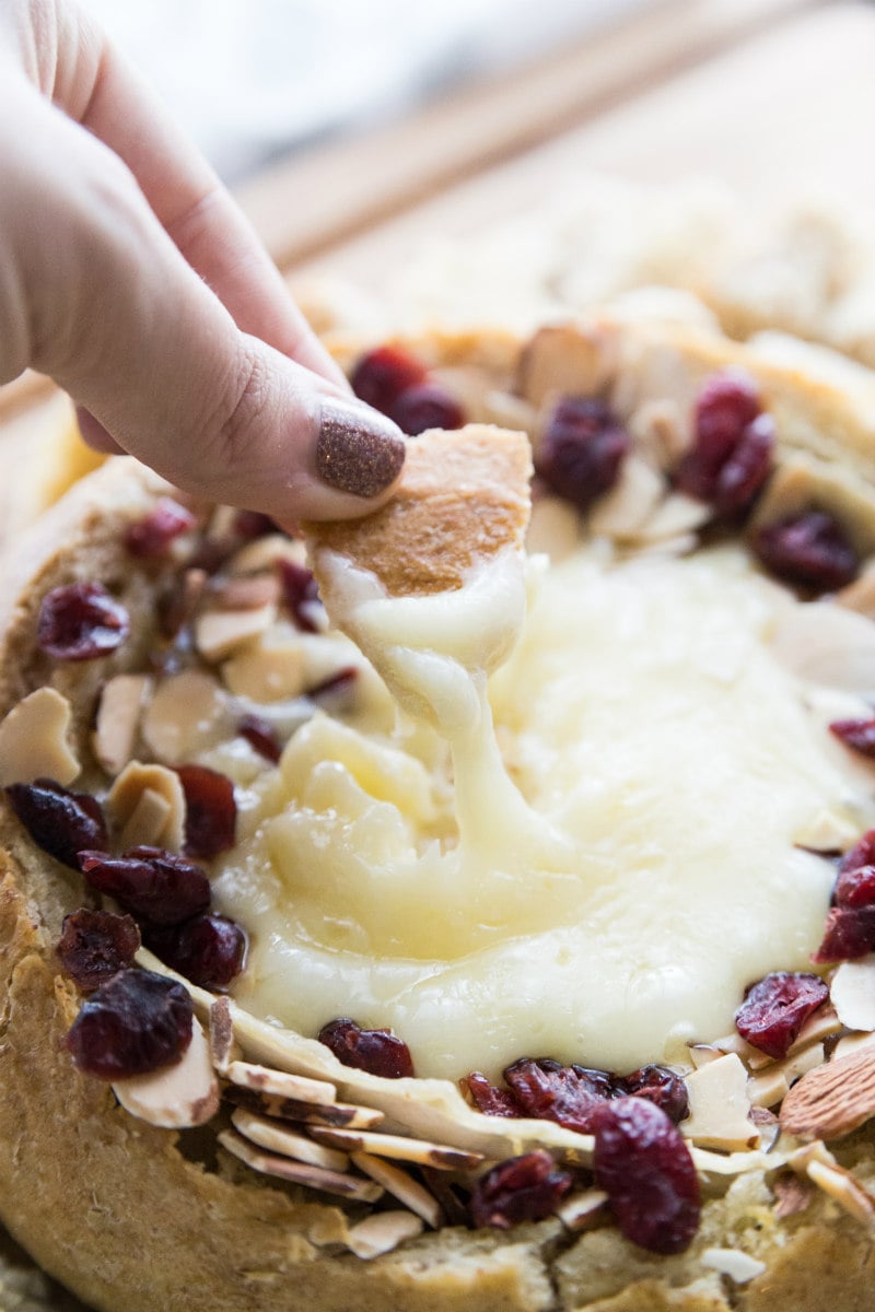 dipping in melted brie appetizer