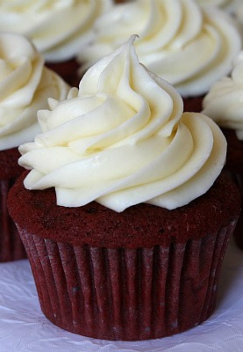 Pipeable Cream Cheese Frosting on a red velvet cupcake