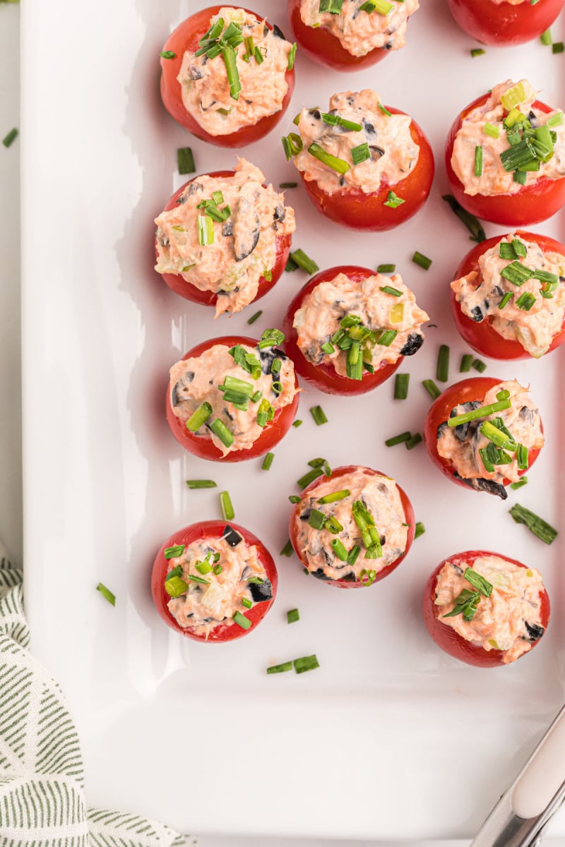 salmon stuffed cherry tomatoes on platter