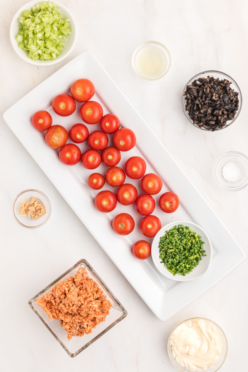 ingredients displayed for making salmon stuffed cherry tomatoes