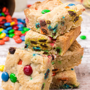 pinterest image for samoa M&M blondies