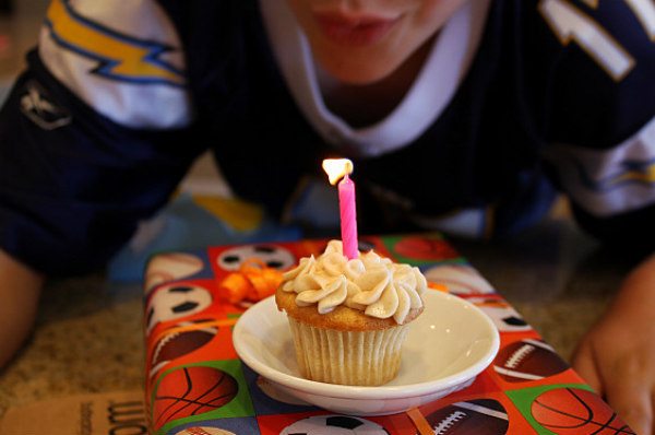 Easy Snickerdoodle Cupcakes with a candle