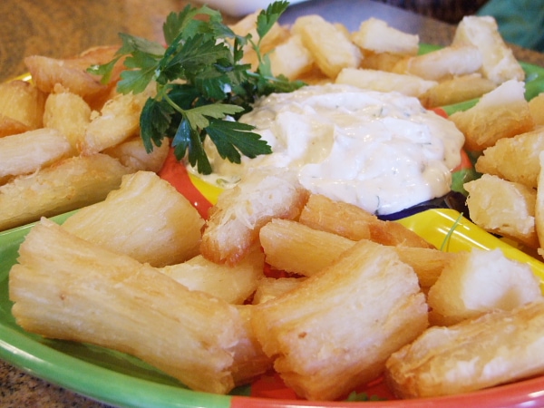 Yucca fries on plate with cilantro mayonnaise