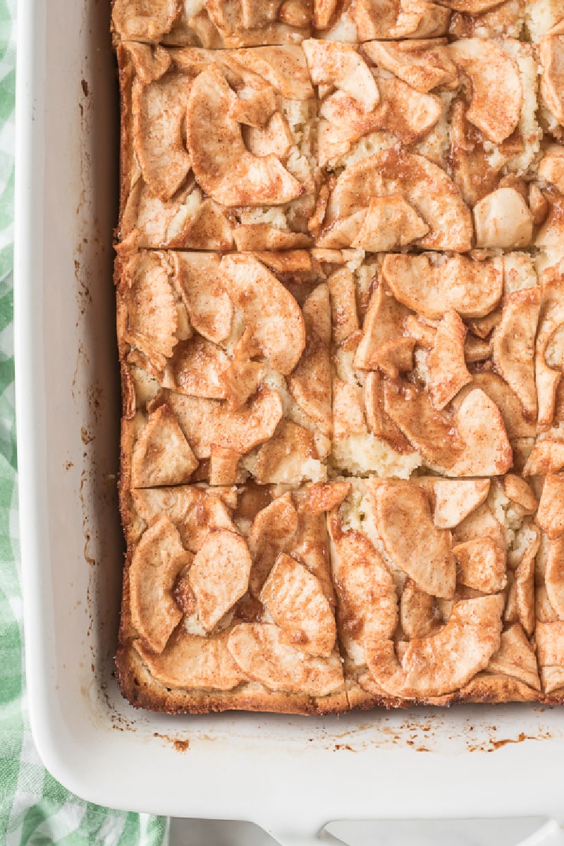 apple cream cheese coffee cake in pan cut into slices