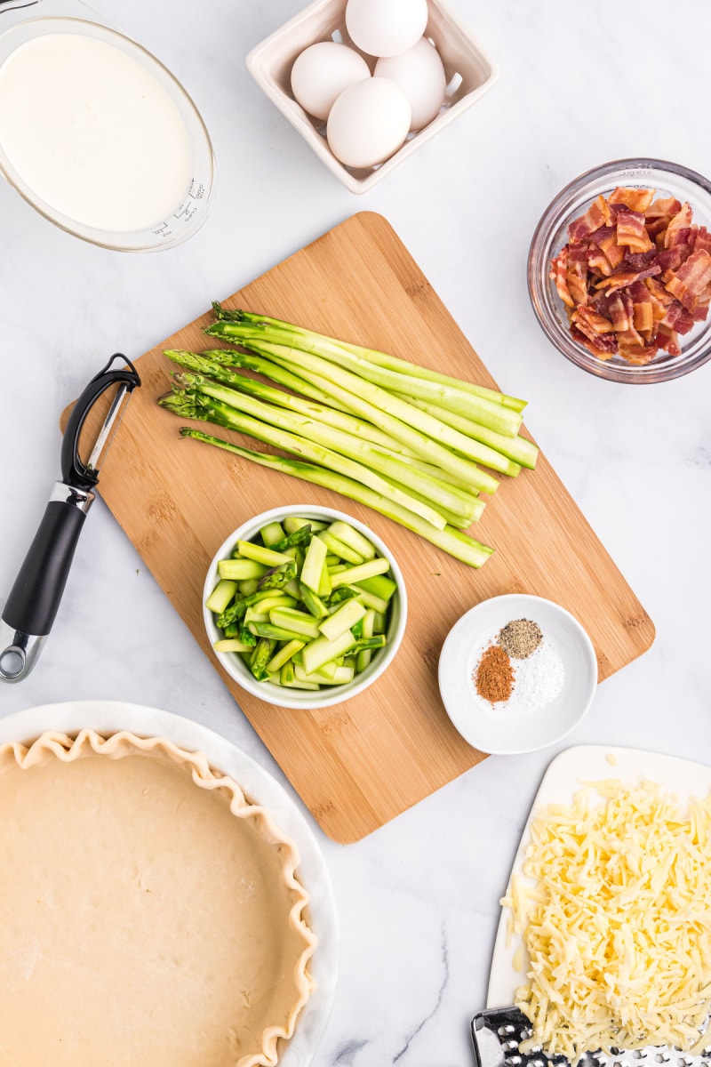 ingredients displayed for making asparagus quiche