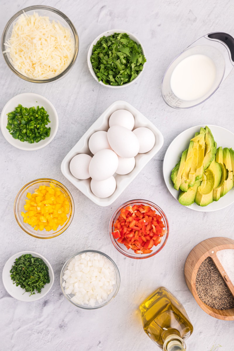 ingredients displayed for making avocado manchego cheese omelette