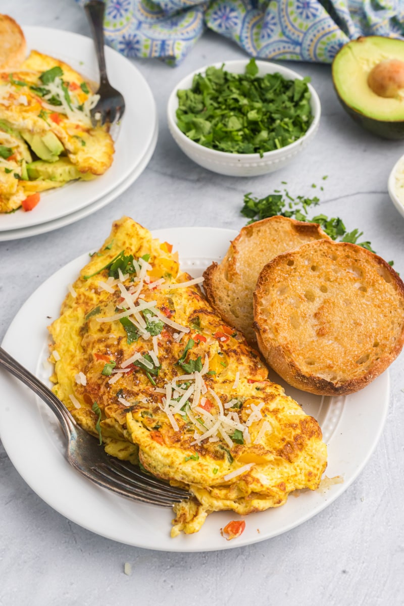 omelette on plate with english muffin