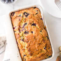 loaf of blueberry zucchini bread in pan