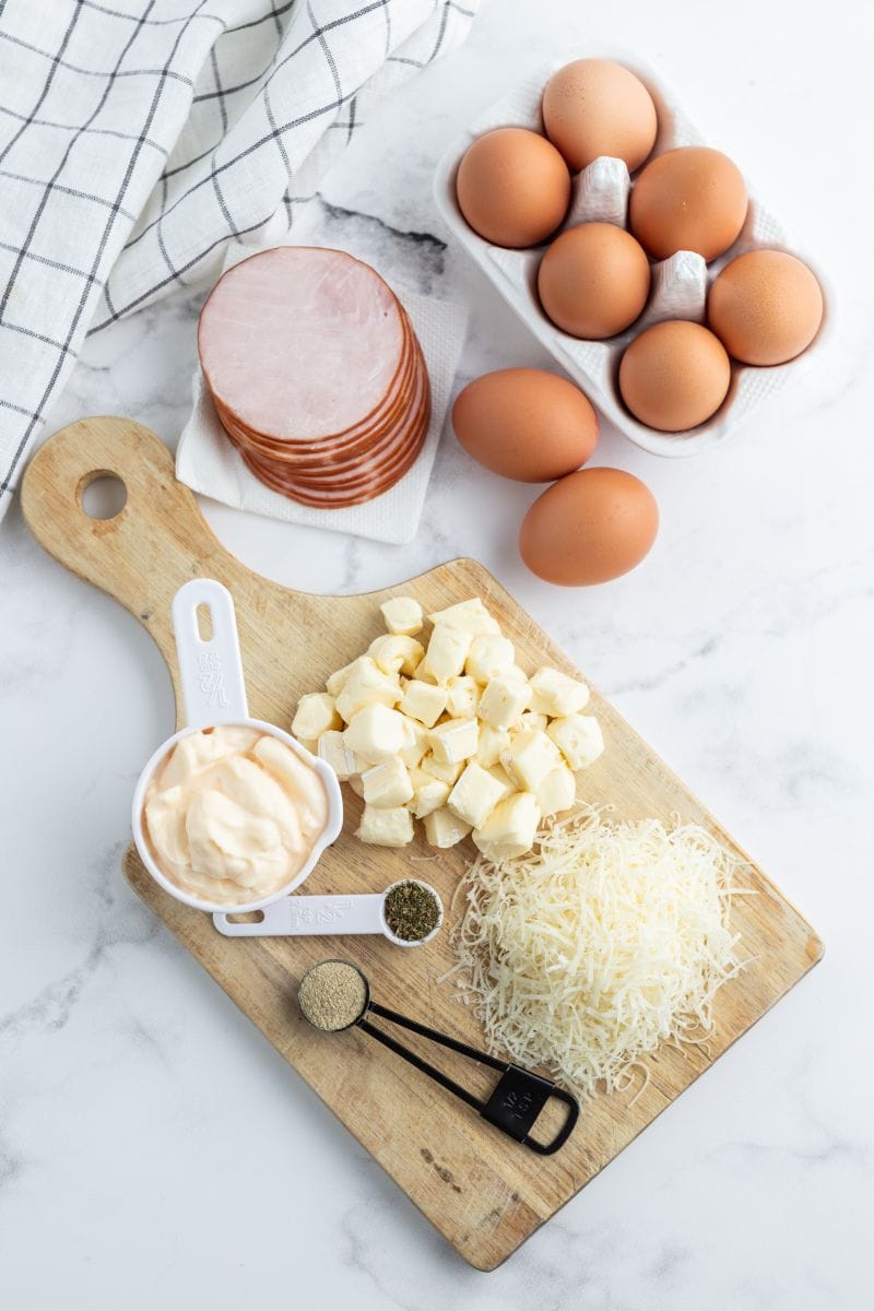 ingredients displayed for making brie and canadian bacon quiche