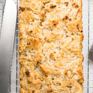 pinterest image for cheese and onion beer bread