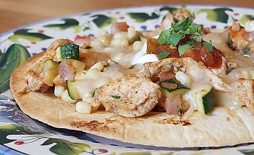 Chicken and Summer Vegetable Tostada on a colorful Mexican print plate