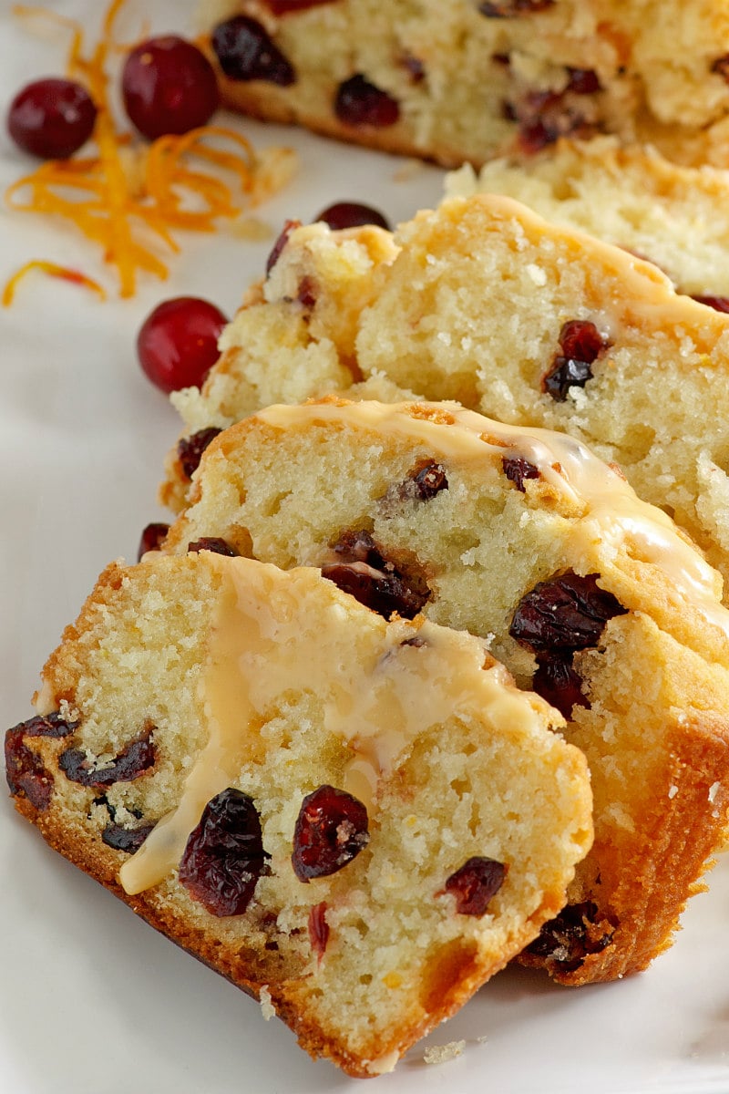 Cranberry Orange Bread with Grand Marnier Glaze curt into slices