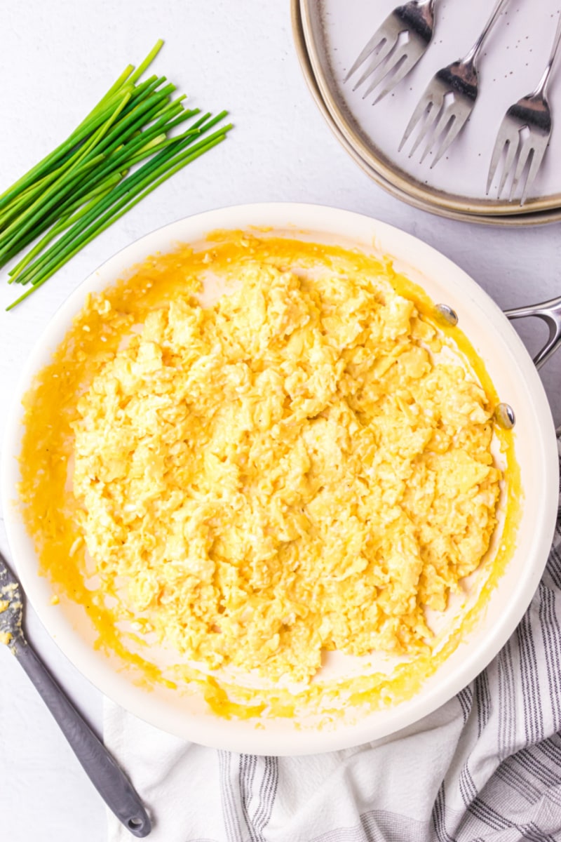 creamy scrambled eggs in a skillet