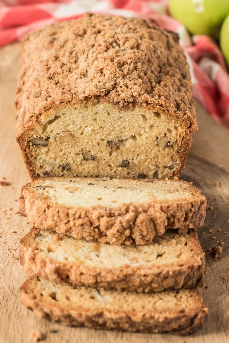 loaf of dutch apple bread on cutting board sliced