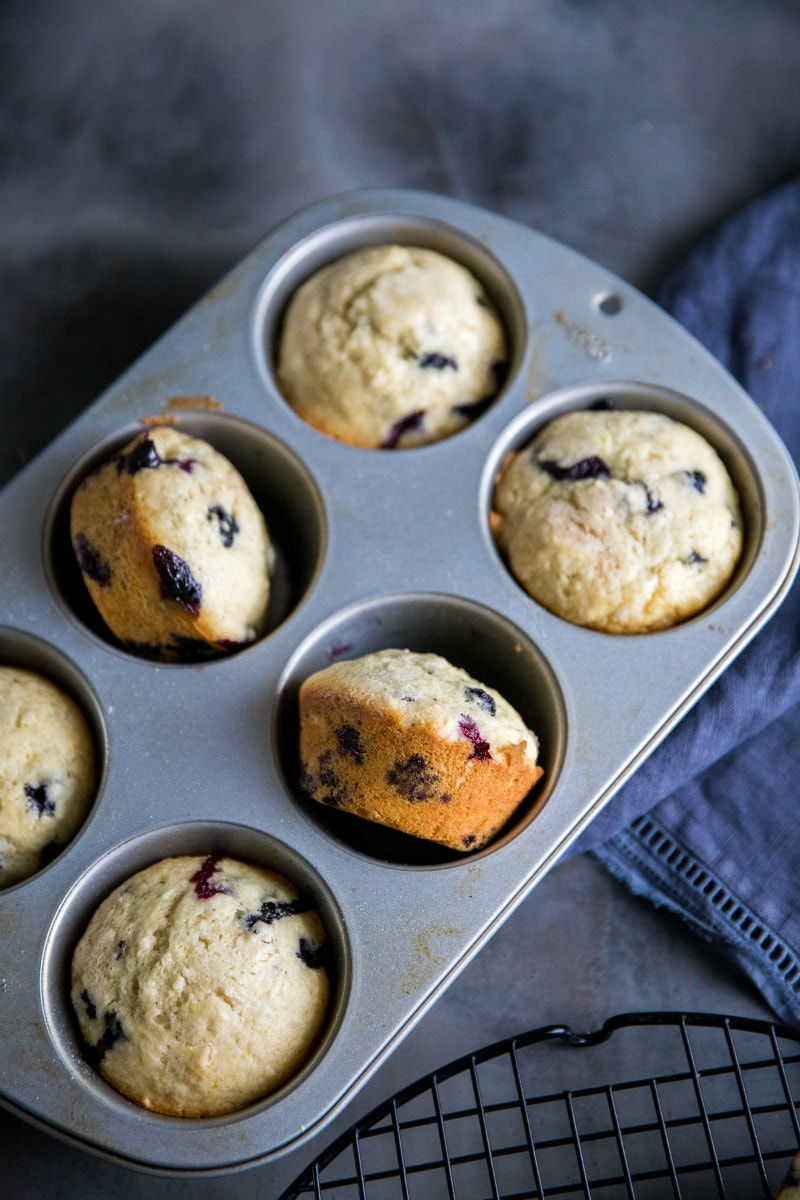 overhead shot of lemon blueberry muffins in a muffin pan