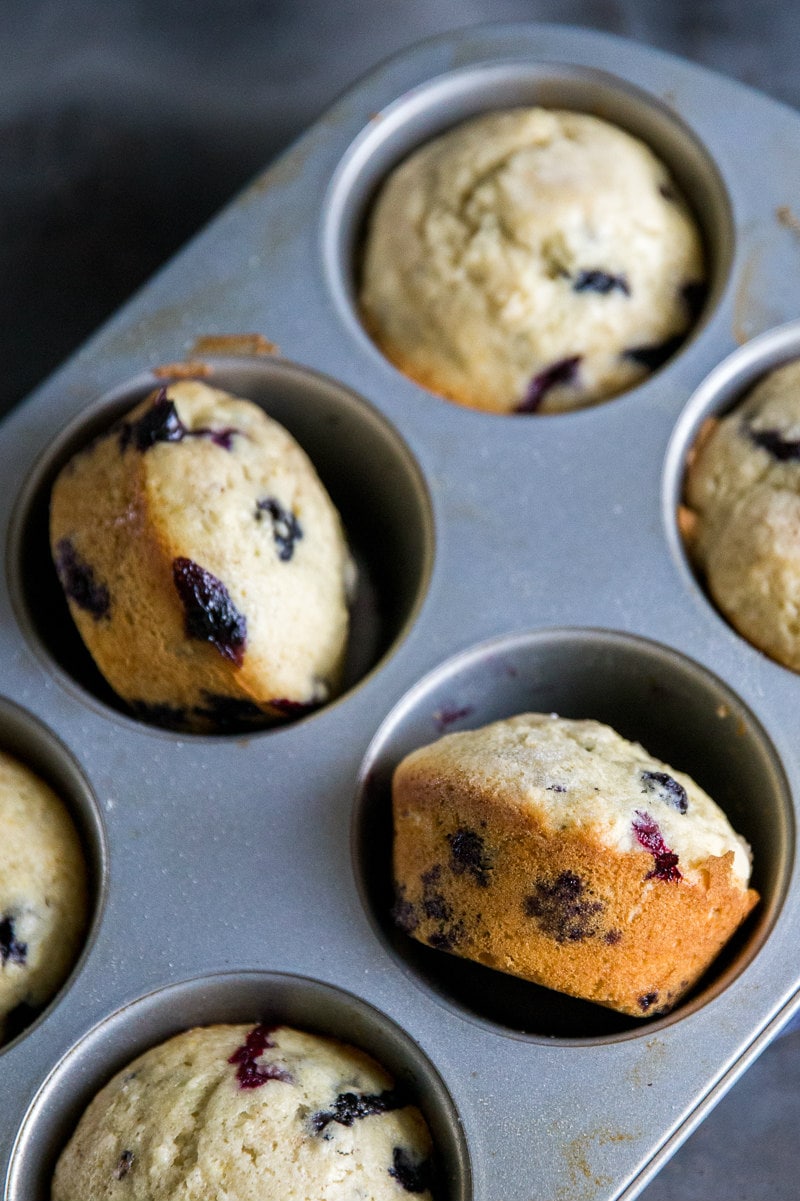 overhead shot of lemon blueberry muffins in a muffin pan
