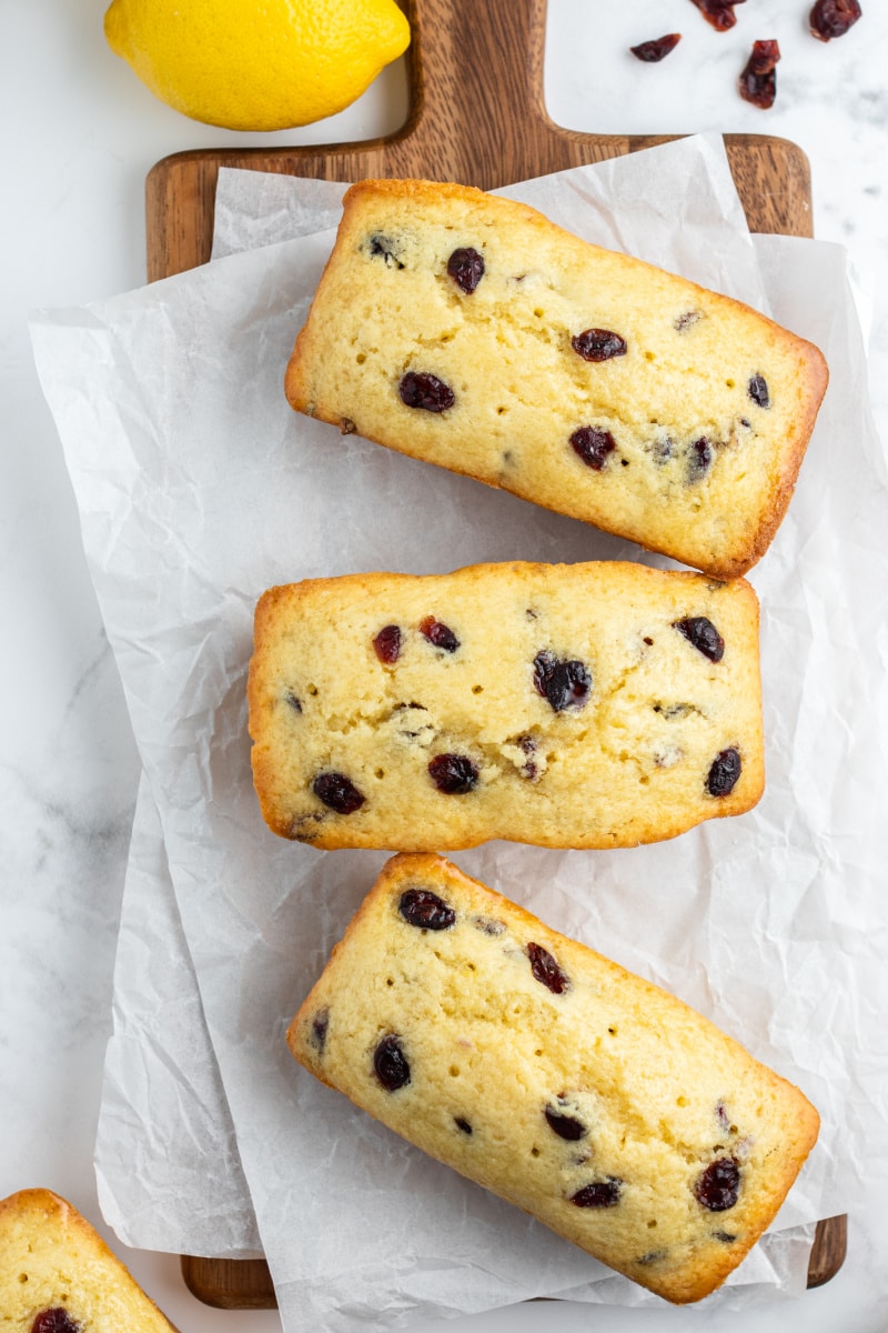 overhead shot of three mini cranberry lemon loaves