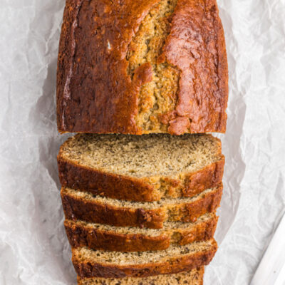 loaf of banana bread half sliced